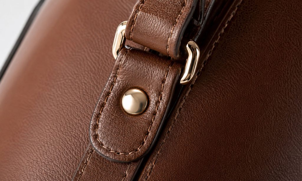 Stress points — handles, corners and zipper surrounds — are where quality construction shows.